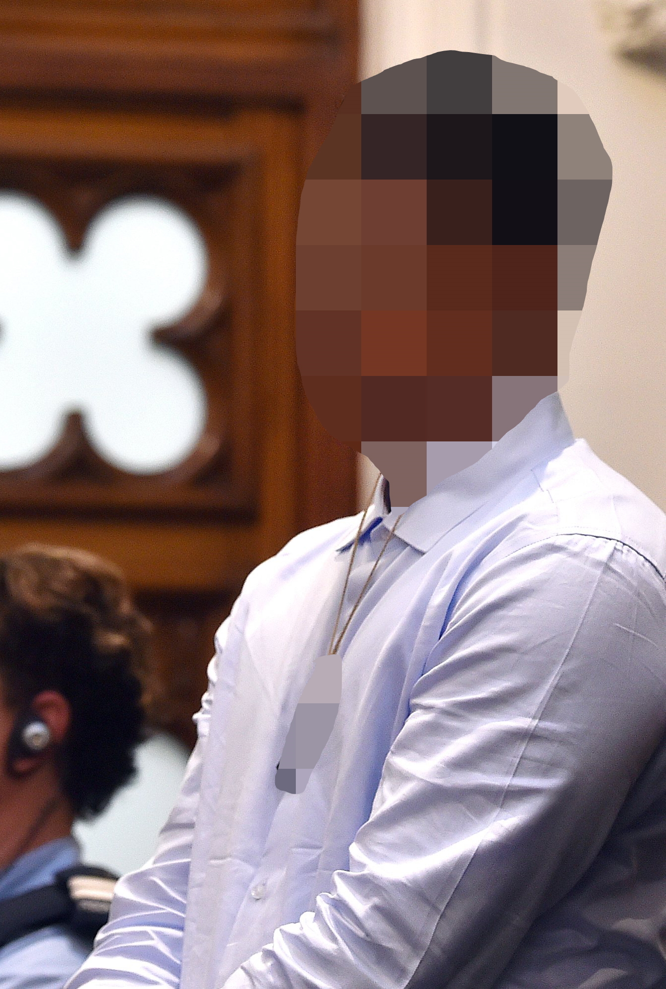 The defendant stands in the dock on the first day of the trial. Photo: Peter McIntosh