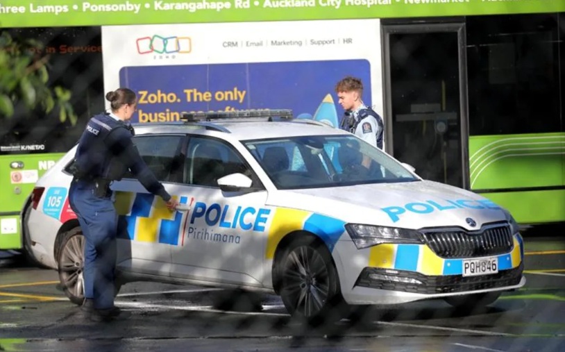 Police at the bus depot on Halsey St after a body was found. Photo: RNZ