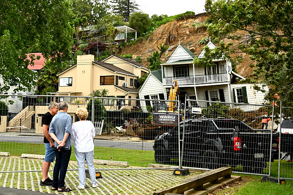 A property in the Auckland suburb of Remuera is cleared in January 2023 after torrential rainfall...