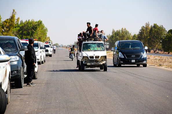 Syrian forces arrive in Sweida to implement the ceasefire amid ongoing clashes between tribal and...