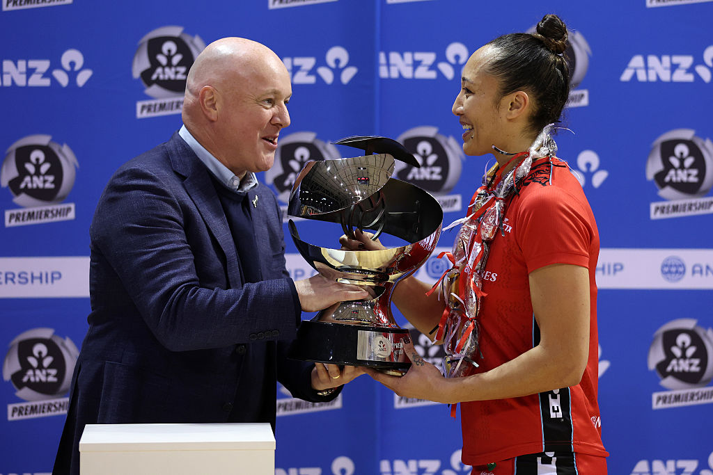 New Zealand Prime Minister Christopher Luxon presents the trophy to Erikana Pedersen of the...