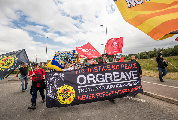 Demonstrators call on the government to implement a public inquiry during the Annual Orgreave...
