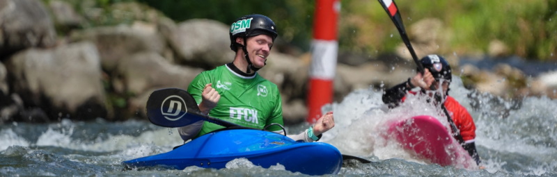 Nick Collier celebrates his win in the kayak cross at the junior canoe slalom world championships...