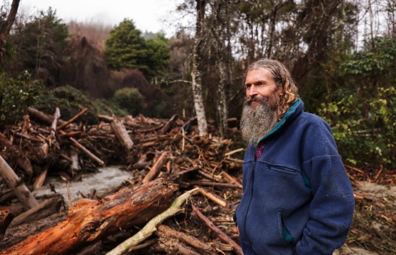 Ngātīmoti resident Shiloh Hobi, on Sunday, after having slash come through his property. Photo:...