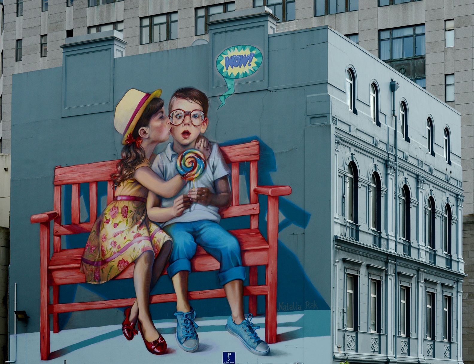 Love is in the Air was painted on the side of the Mansfield Apartments building in 2015 by Polish...