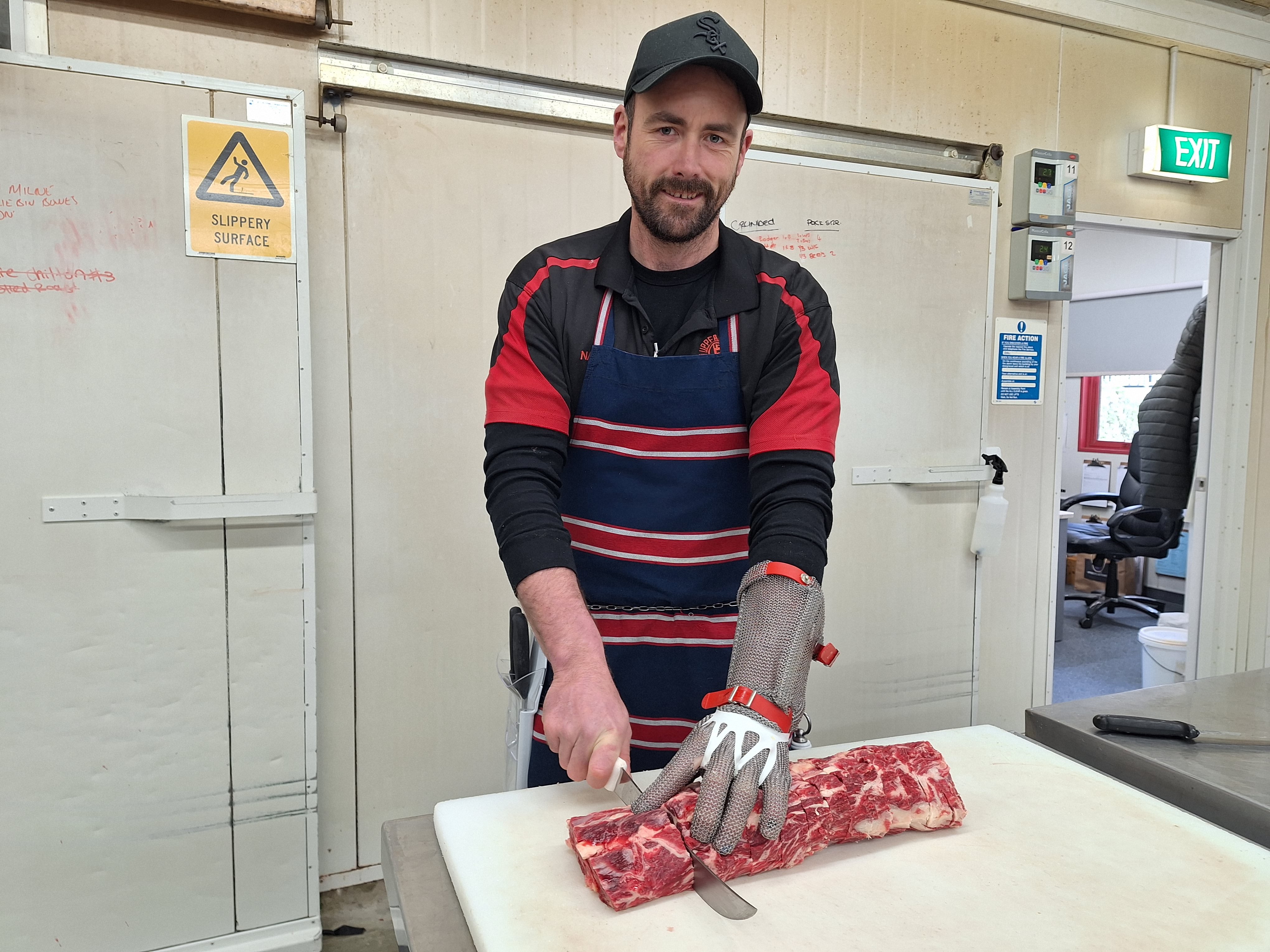 Uppercuts Butchery owner Nathan Kean hard at work at his store in Winton last week. PHOTO: NINA TAPU