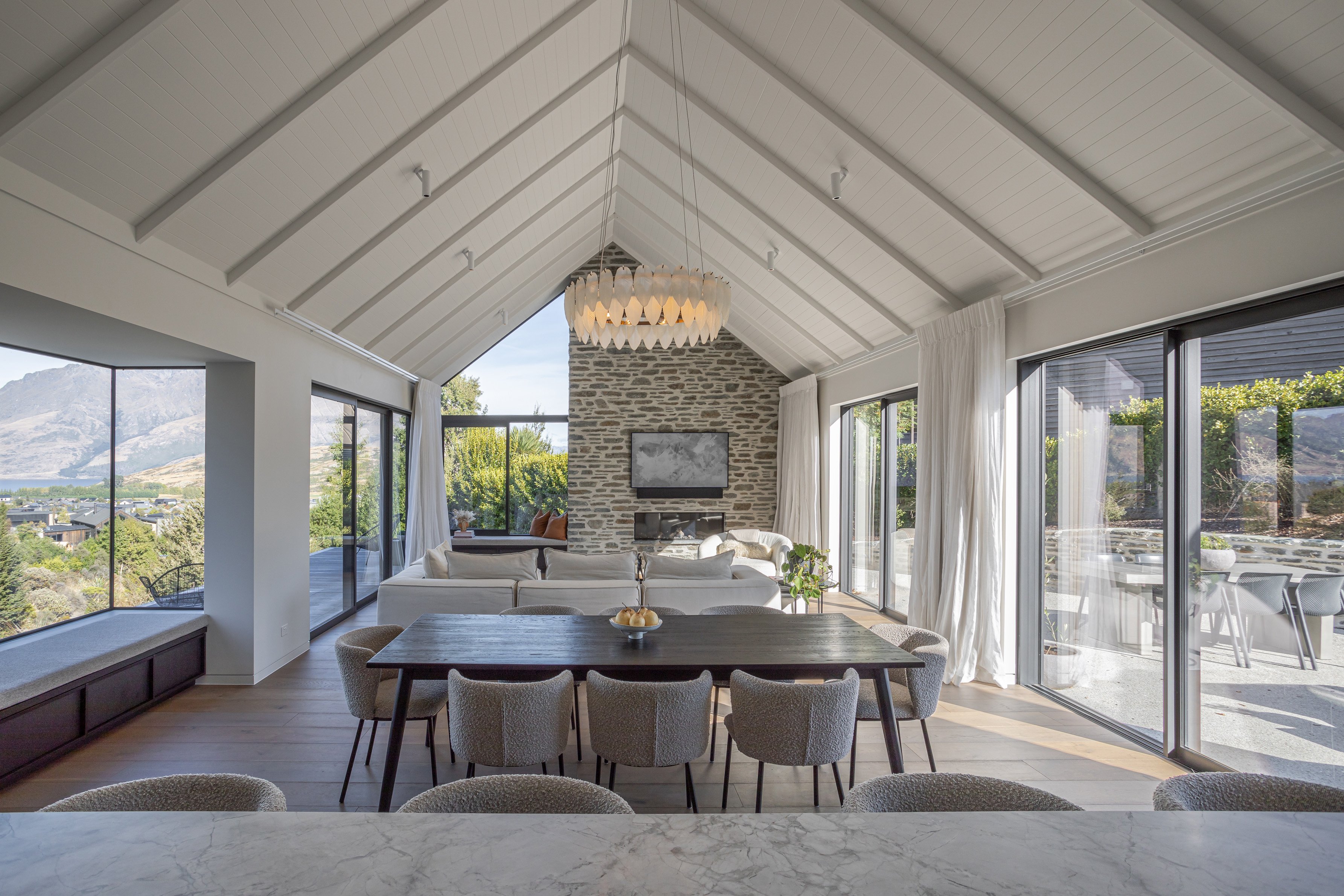 A gabled living space and stone fireplace helped create the homely, welcoming feel the owners...