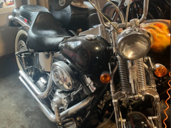 A motorbike was among the possessions seized "as suspected assets from criminal offending". Photo...