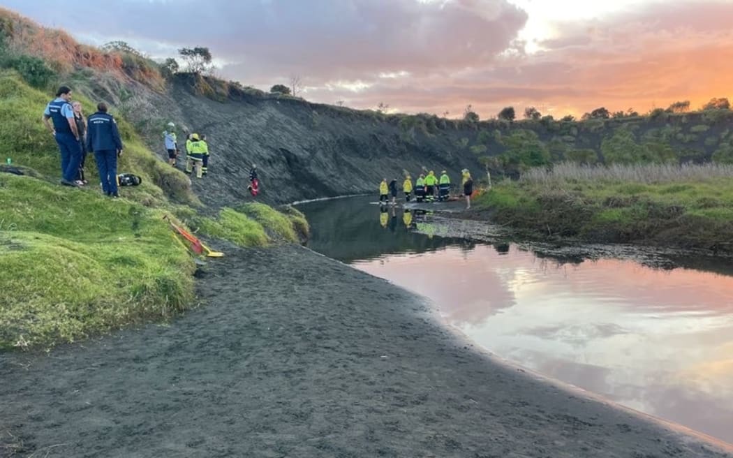 The sand dune collapsed on a man as he was digging into it at Muriwai Beach. Photo: Supplied...