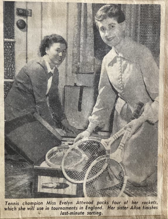 An article at the time of Evelyn Attwood (right) with her sister, packing for England.