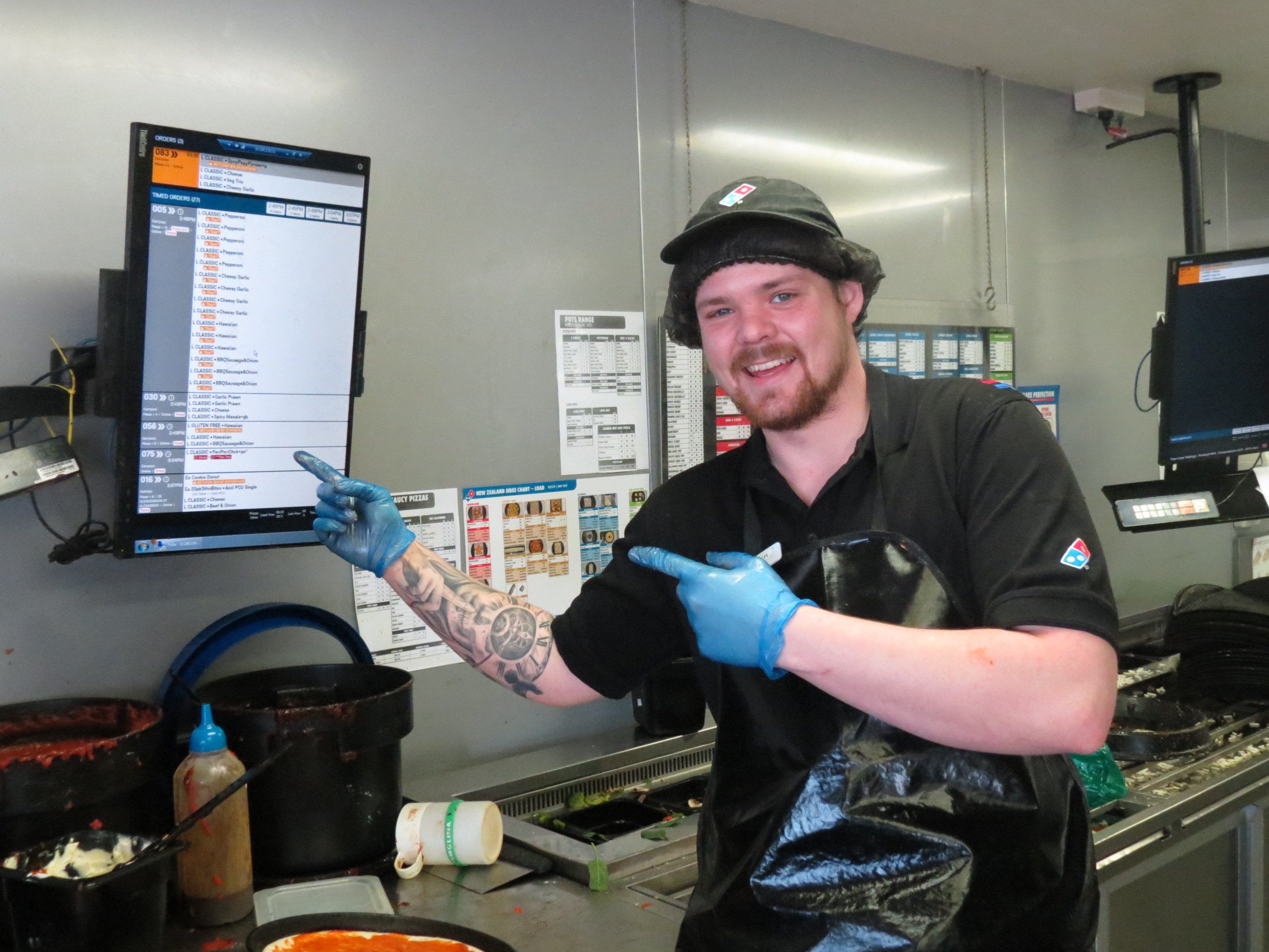 Alexandra Domino's manager Tyler Clarke with the unusually busy afternoon’s worth of orders....