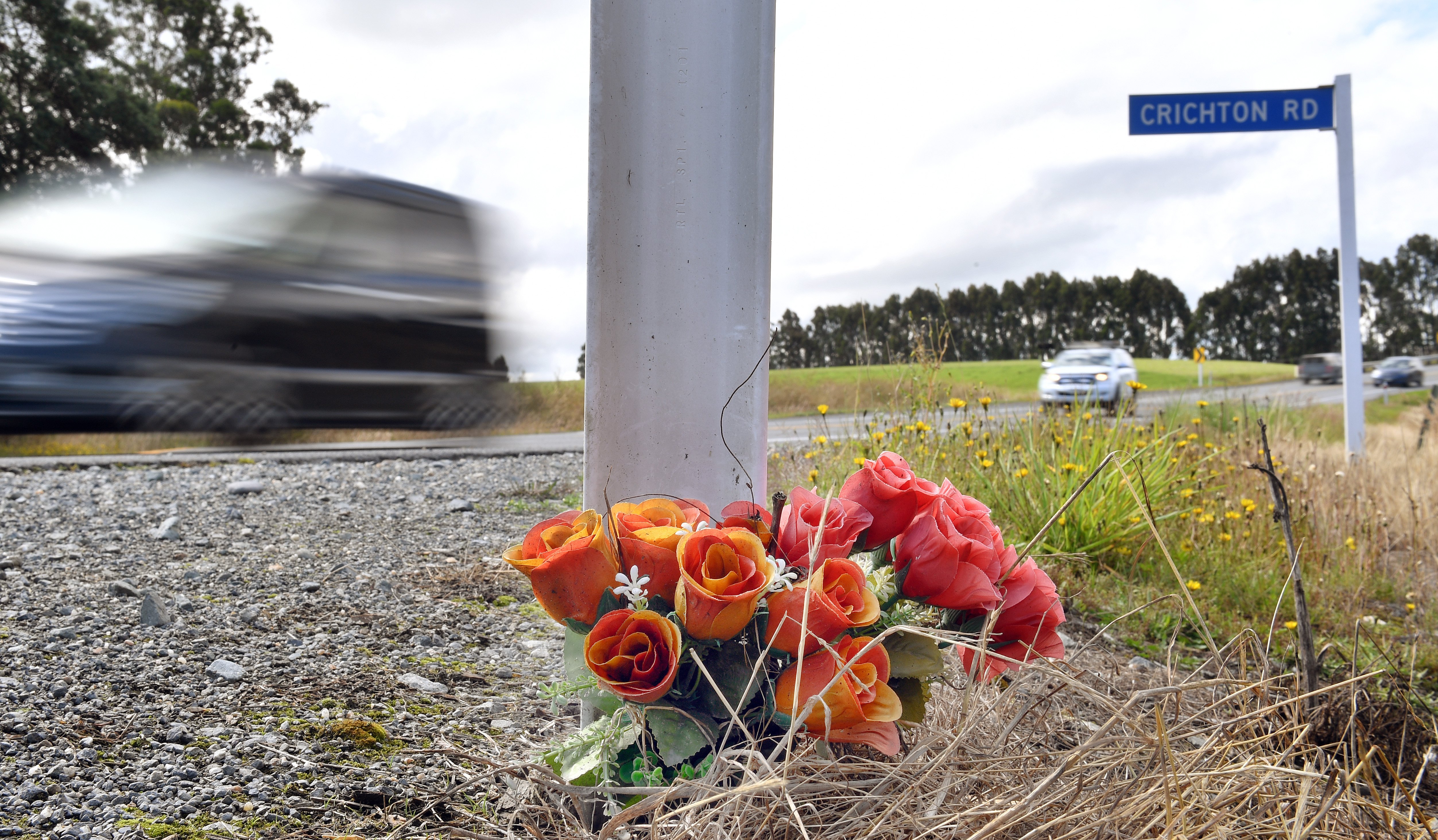 Flowers near where Ms Challis died in a car crash beside SH1 at the Crichton Railway Overpass....
