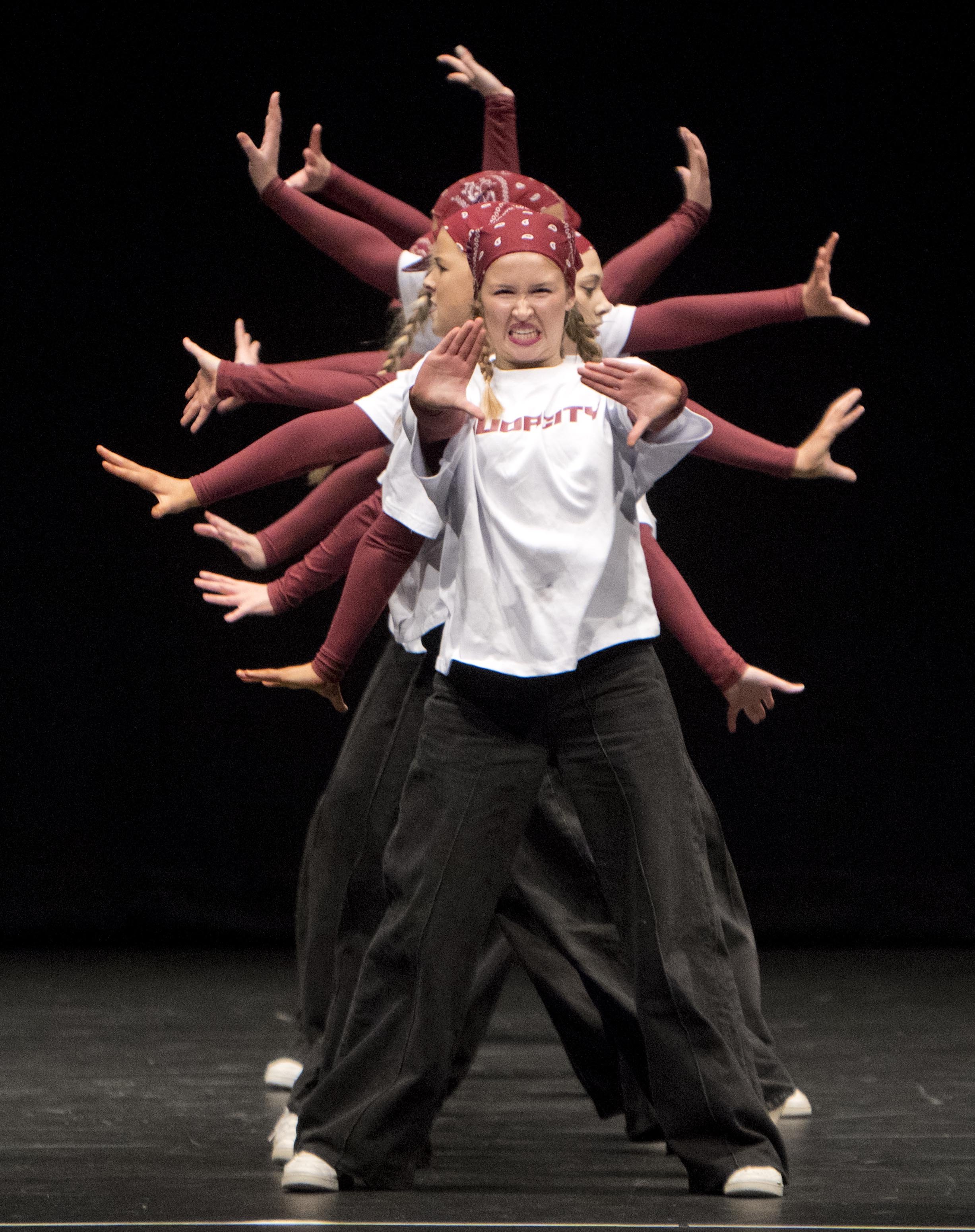 Queen’s High School hip-hop dance team Audacity member Hannah Geary, 15, leads the pack during...