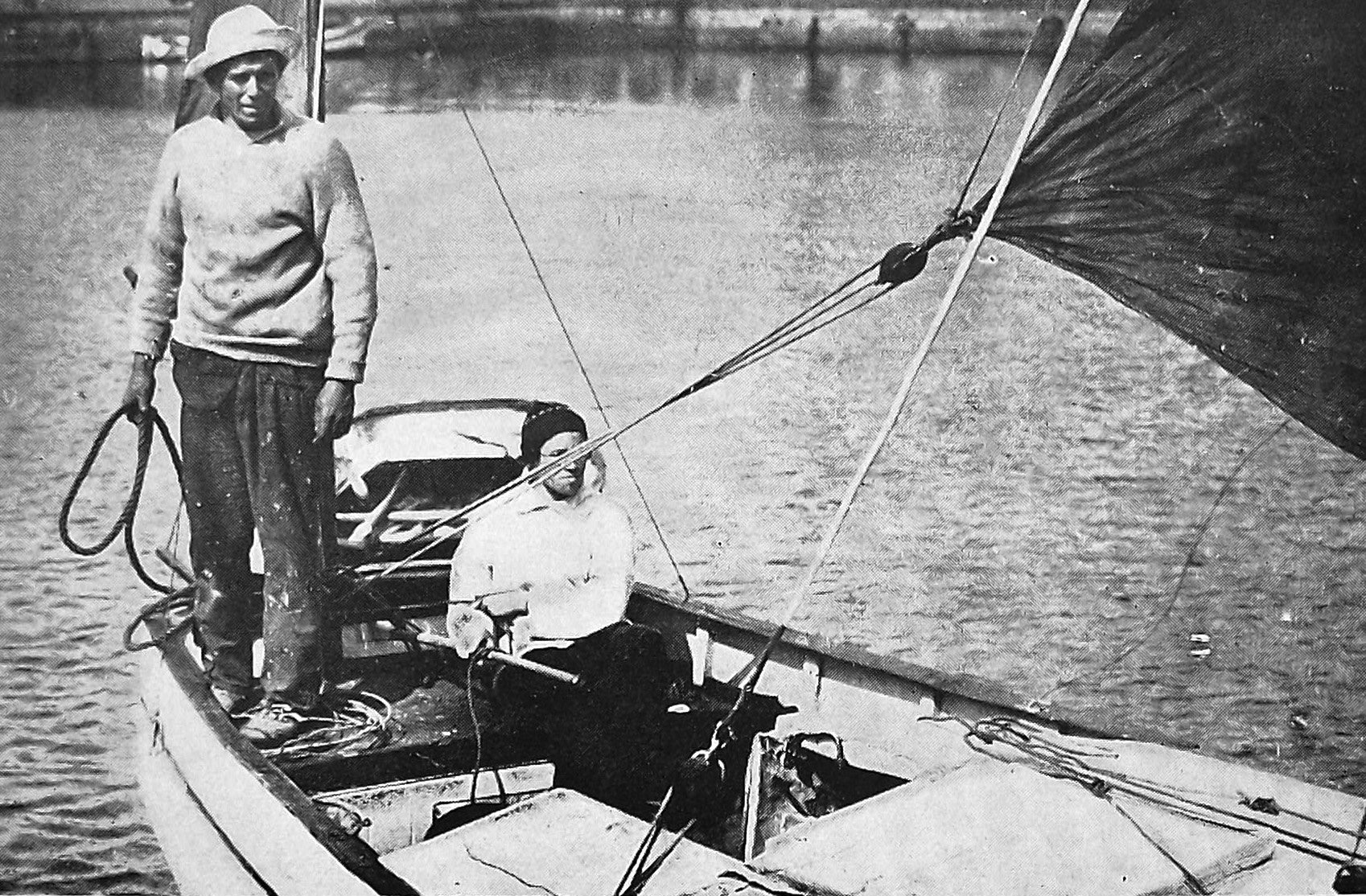 William Unitt and his daughter Dora, in Plymouth, Devon in their 20-foot yawl 'Merganser'. —...