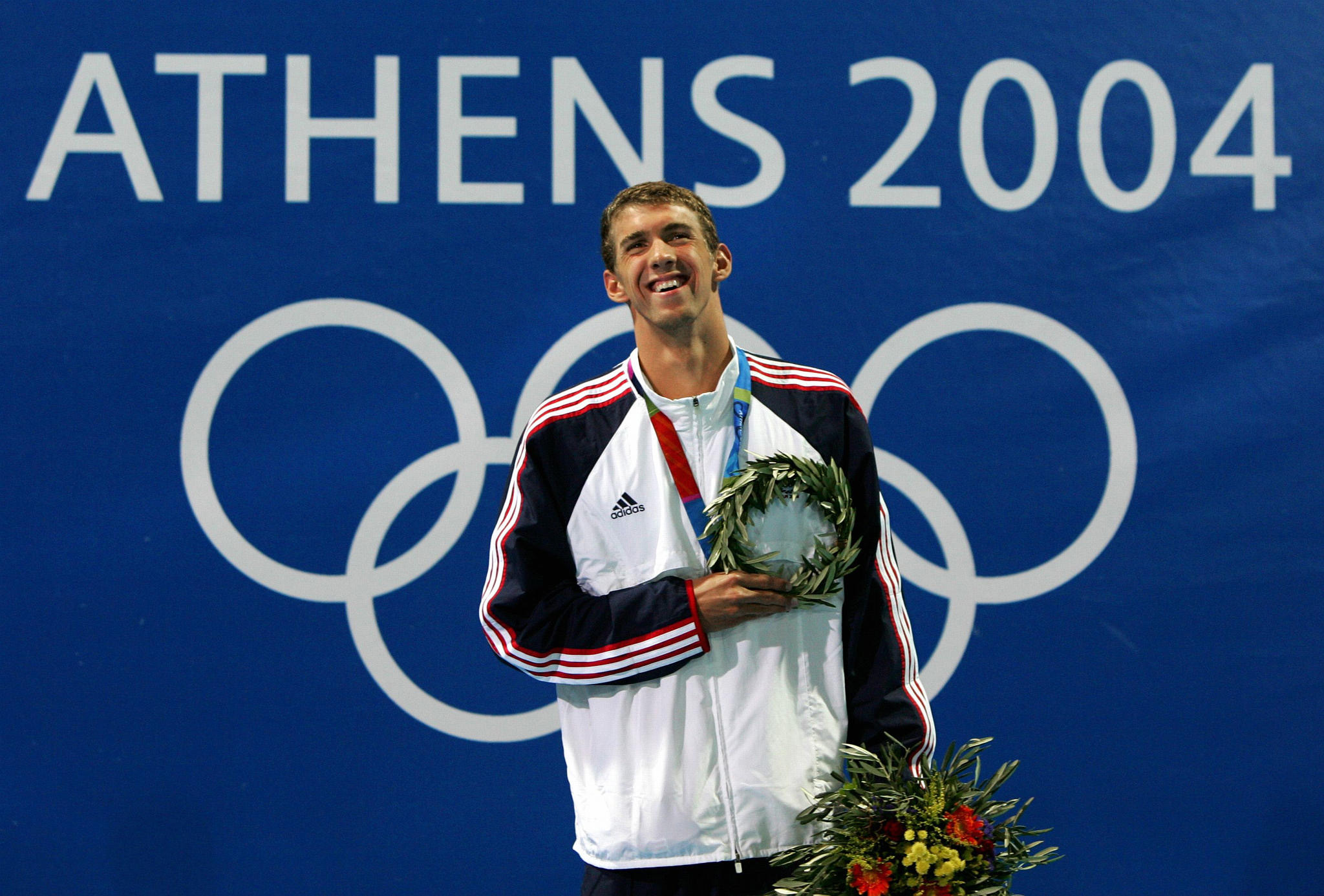 Michael Phelps on the Olympic podium, again, in 2004. PHOTO: REUTERS