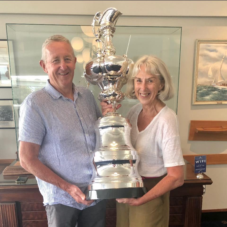 Peter Lester and sister, Jill Ineson, hoisting the famed America’s Cup. Photo: Facebook