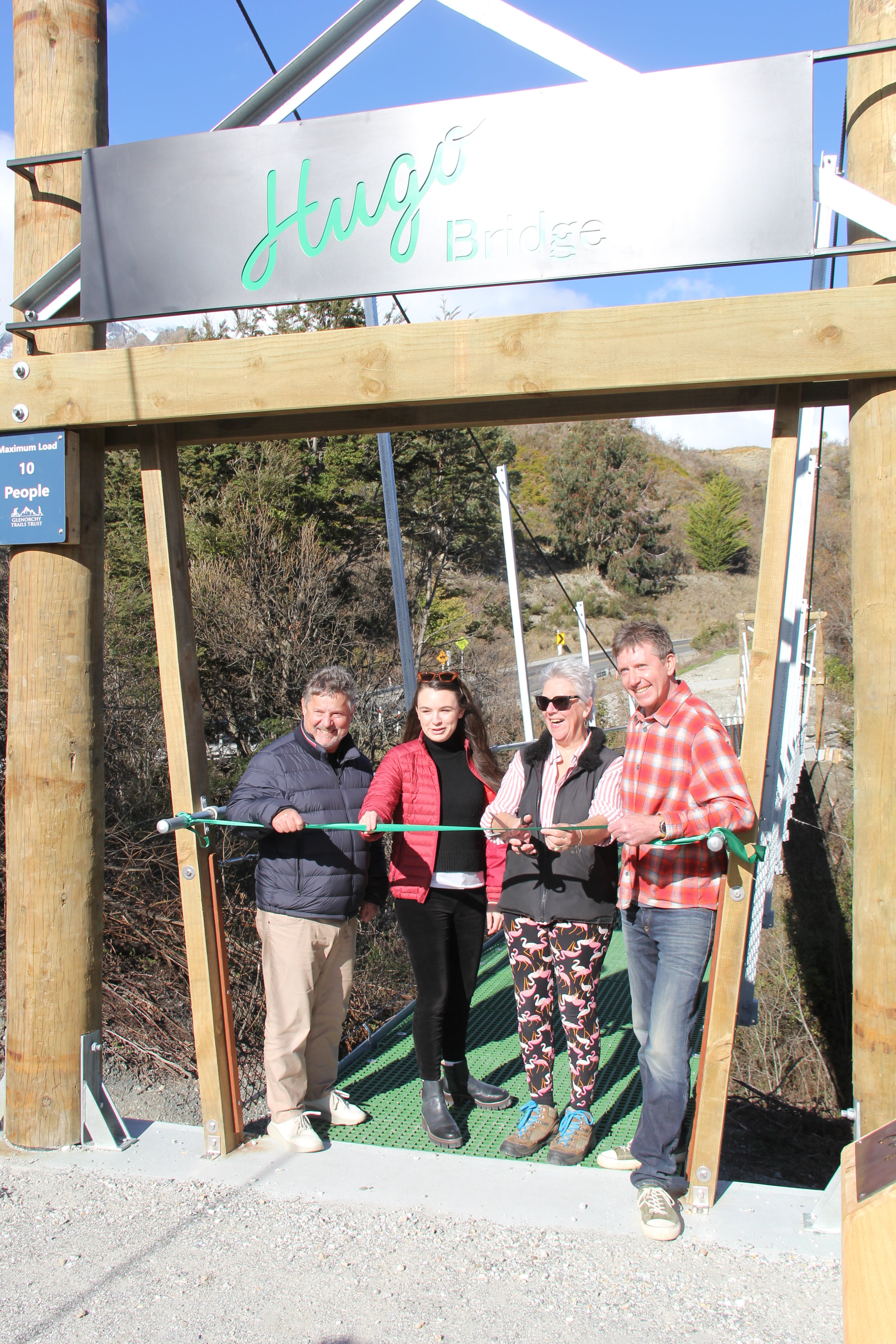 Pictured cutting the ribbon to open the Buckler Burn Hugo Bridge in Glenorchy on Saturday are ...