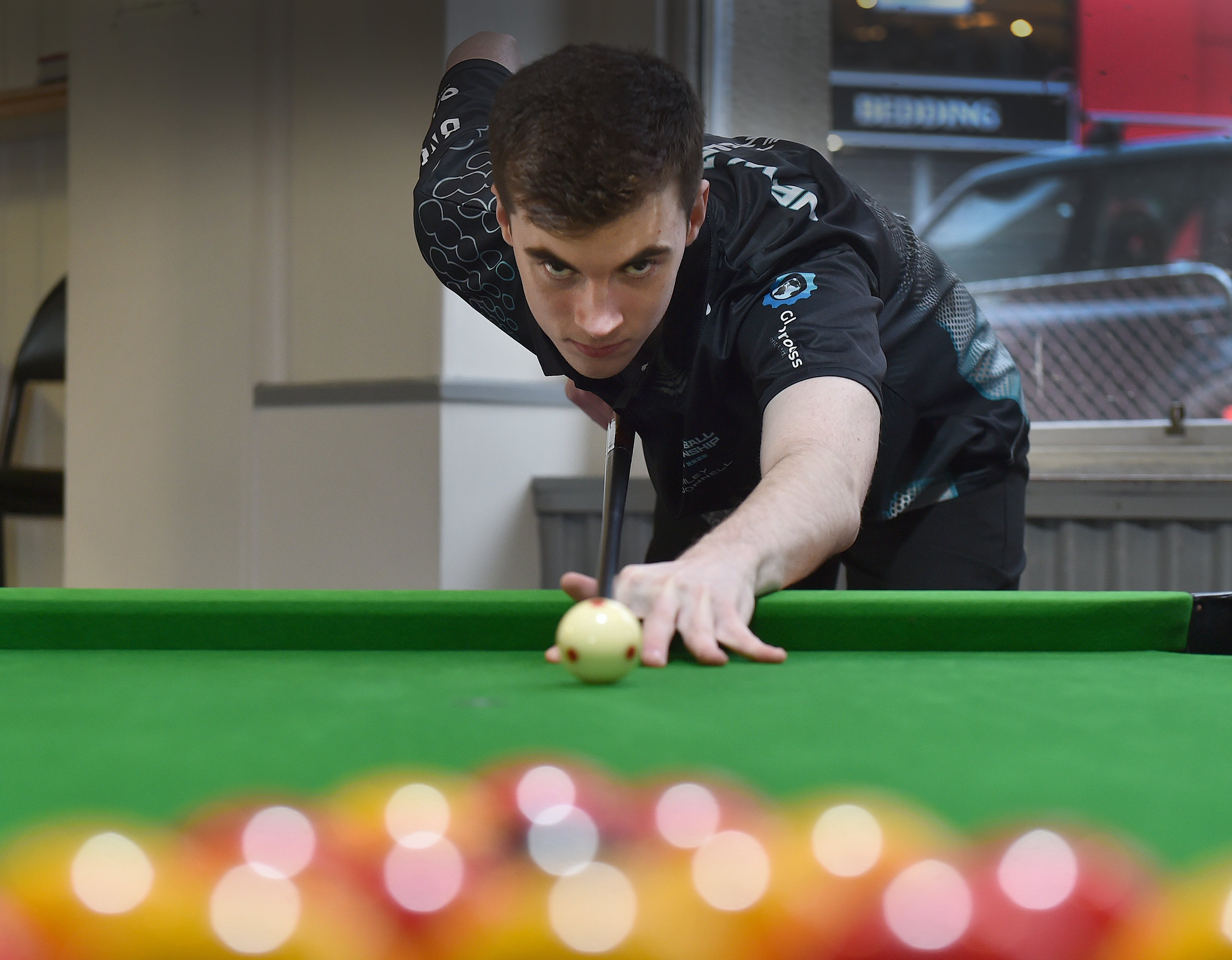 Dunedin pool player Riley O’Donnell gets in some final practice before heading to the world...