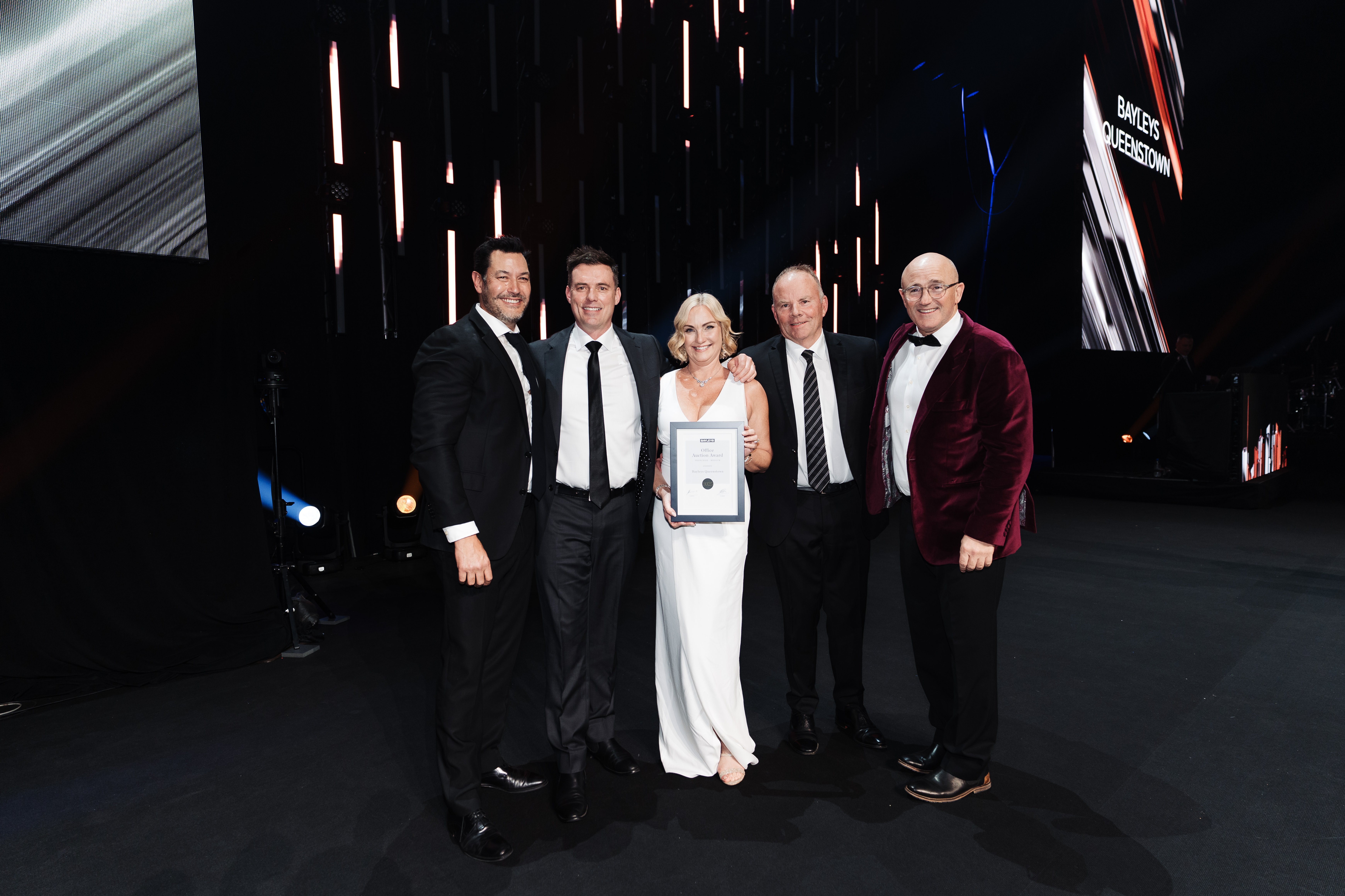 Local Bayleys sales manager Dee McQuillan with her ‘national sales manager of the year’ award...