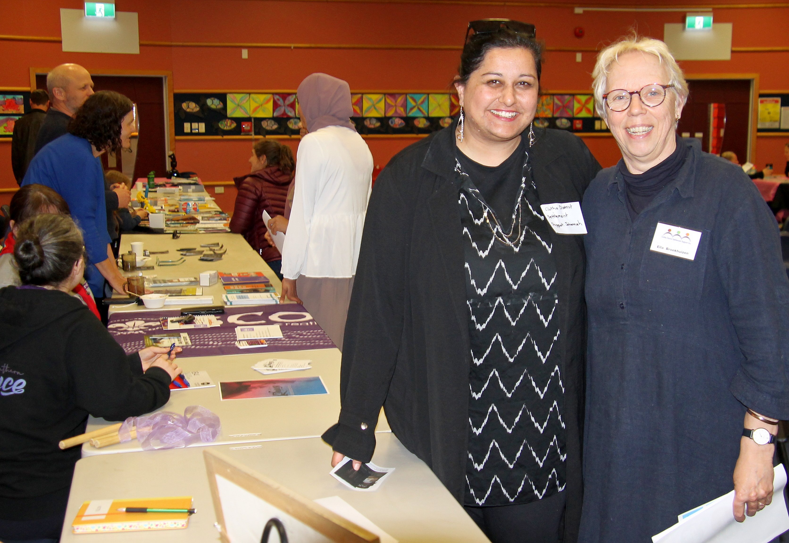 Johannah Prasad (left) and Ella Broekhuizen at Clutha District Settlement Support’s information...