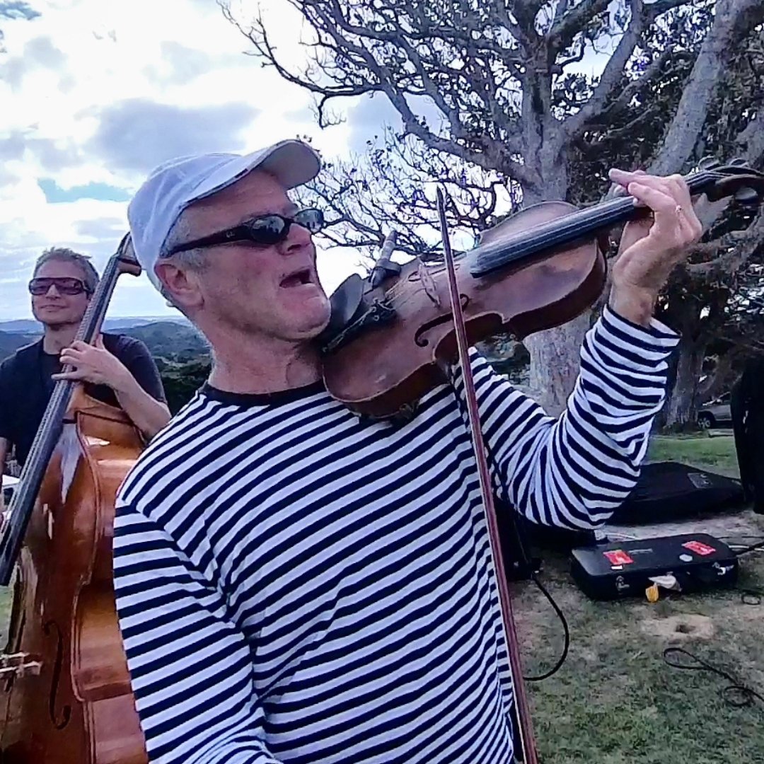 Nairobi Trio musicians Richard Adams (front) and Aaron Coddel, on bass, along with John Quigley ...