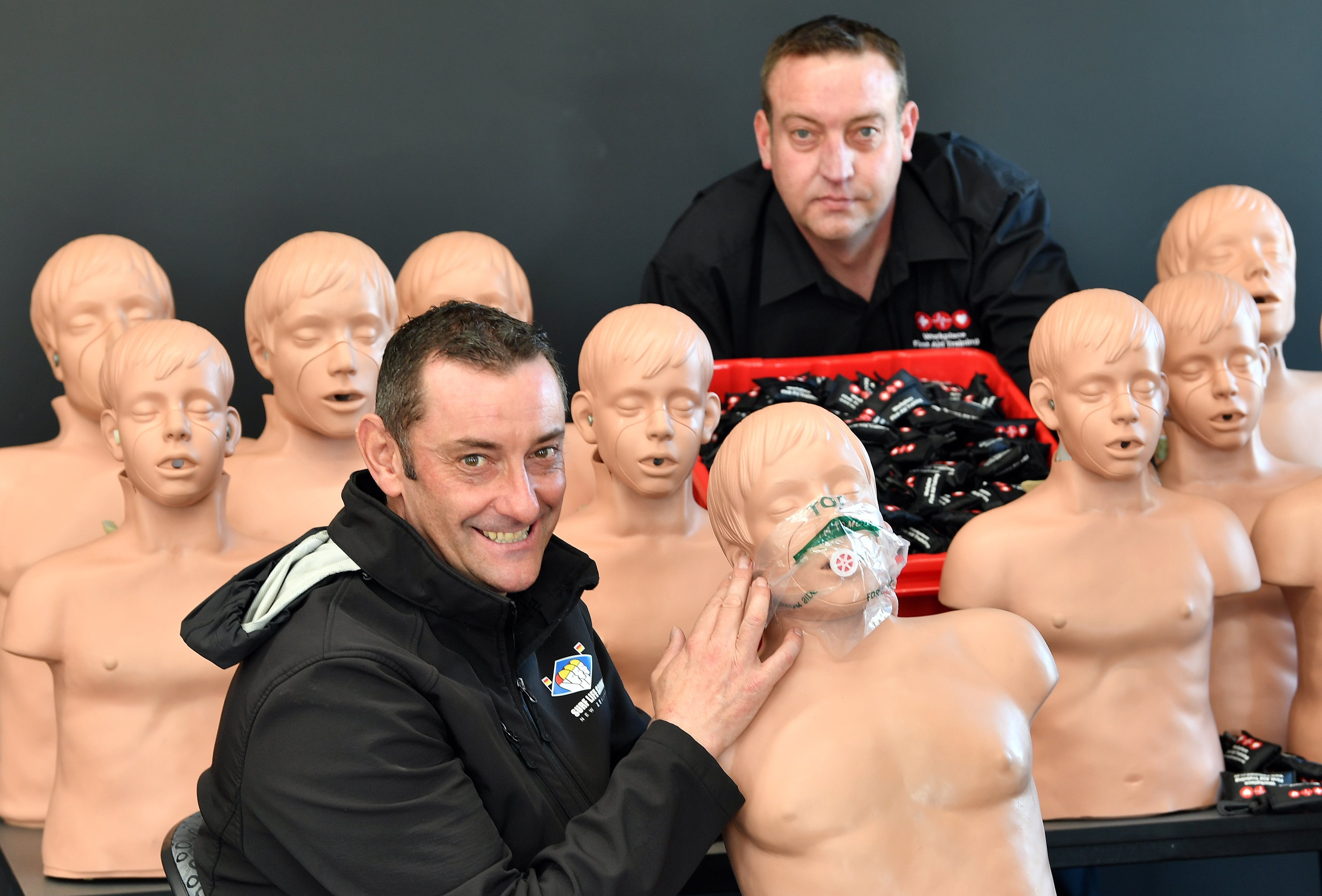 Surf Life Saving New Zealand national health and safety adviser Scott Weatherall (front)...
