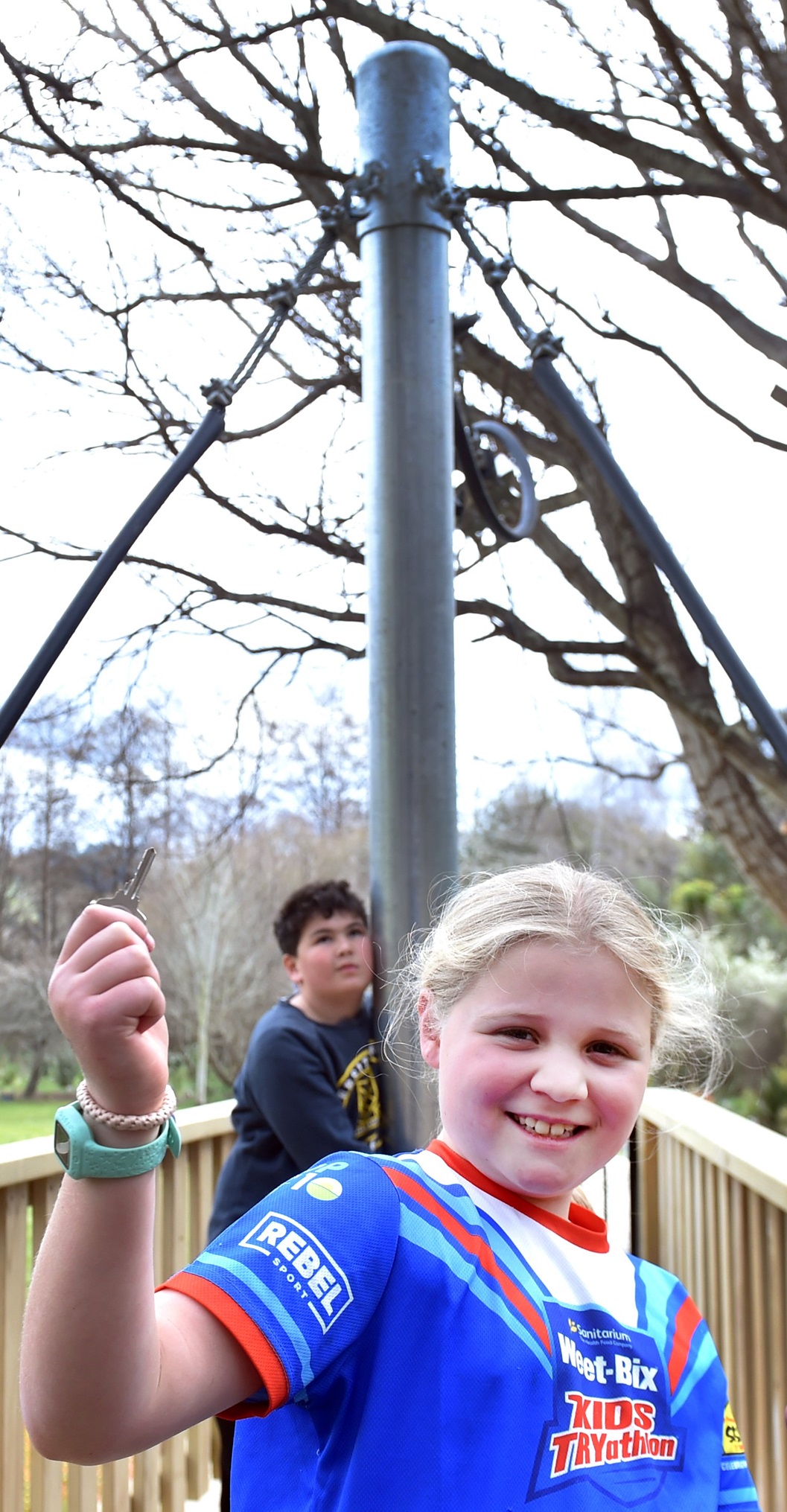 Waitati School pupil Polly McEwan, 8, holds a key to the seat on the flying fox as classmate...