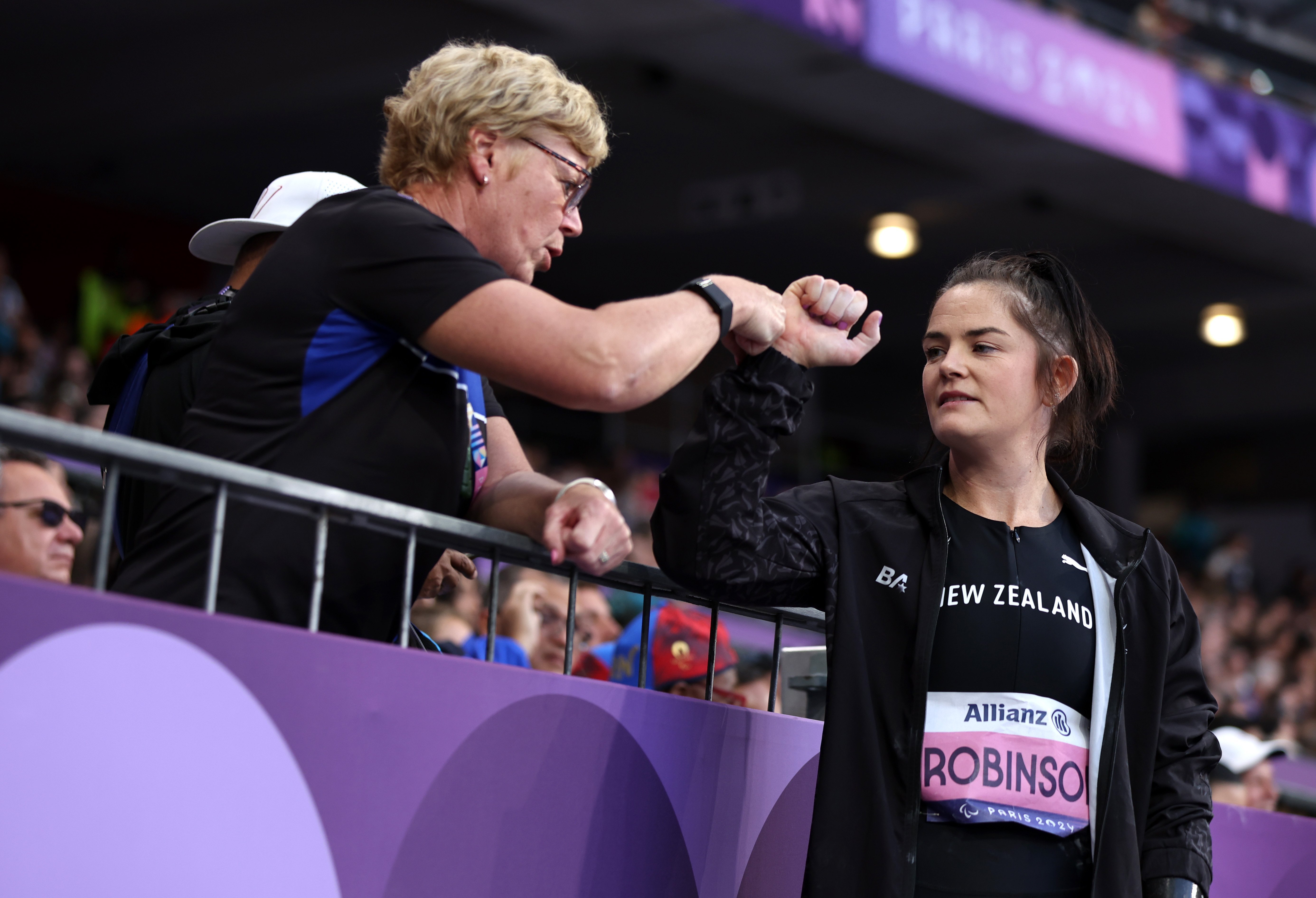 Holly Robinson, pictured with coach Raylene Bates at the Paris Paralympics, is preparing for the...