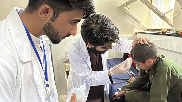 Doctors treat an injured boy at a hospital in Nangarhar hospital after Monday's shallow quake....