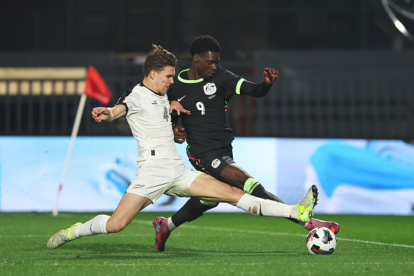All Whites defender Tyler Bindon battles for possession with Socceroo Mohamed Toure, who scored...
