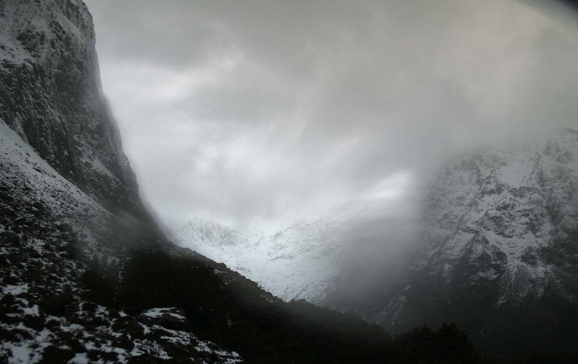 Snowy conditions in Milford's Gertrude Valley this afternoon. Photo: NZTA