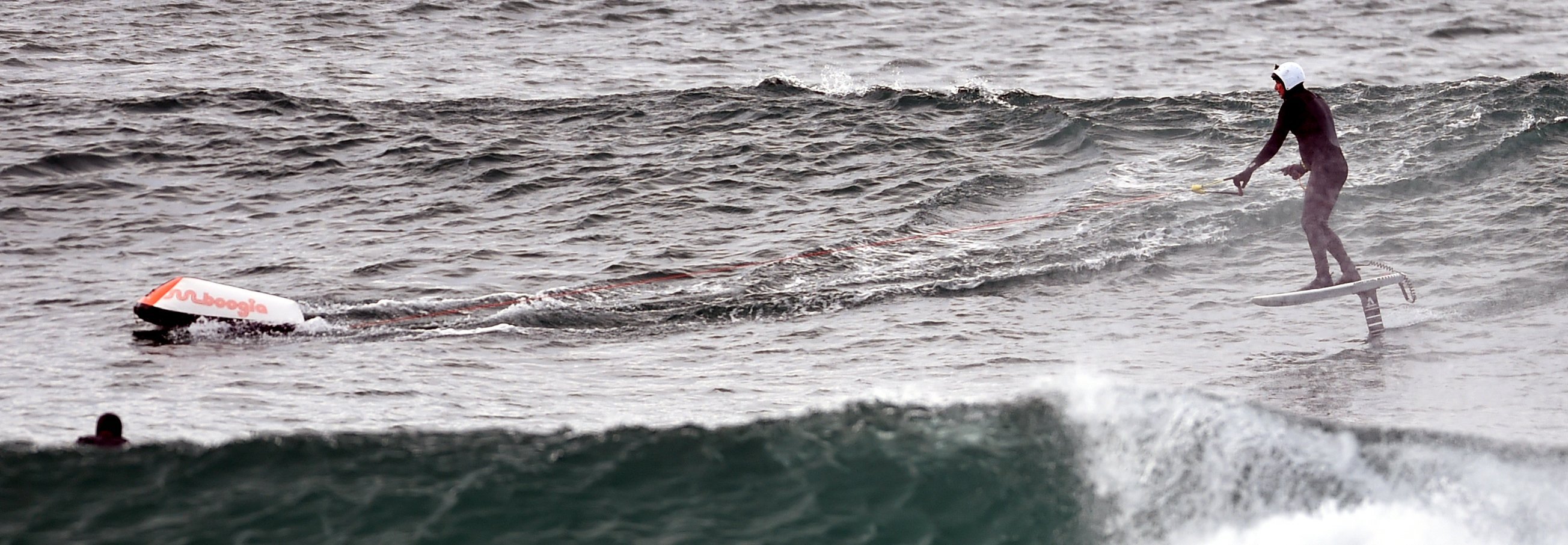 Nick Smart of the Catlins navigates his hydrofoil at St Clair Beach on Friday. PHOTO: PETER MCINTOSH