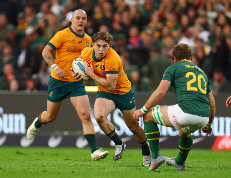 Australia's James O'Connor in action with South Africa's Kwagga Smith during their Rugby...