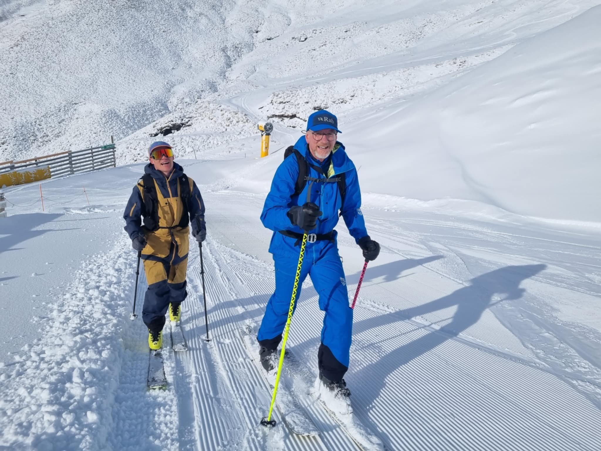 Mr Stichbury (right) and friend Ian Evans near the top of Treble Cone on their ‘‘Everest’’ climb.