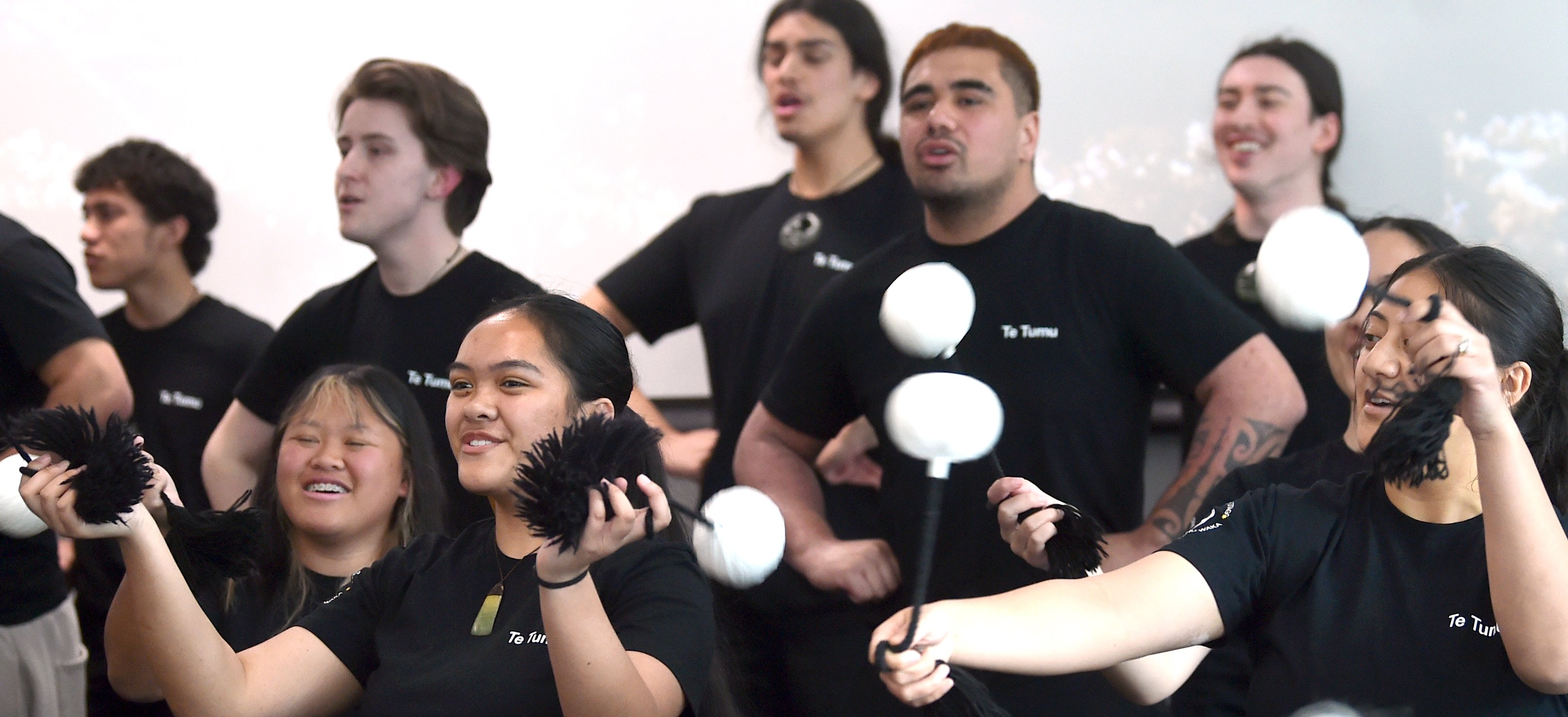 University of Otago students of Maori Maumahara Paringatai (left) and Lilli Baxter use poi while...