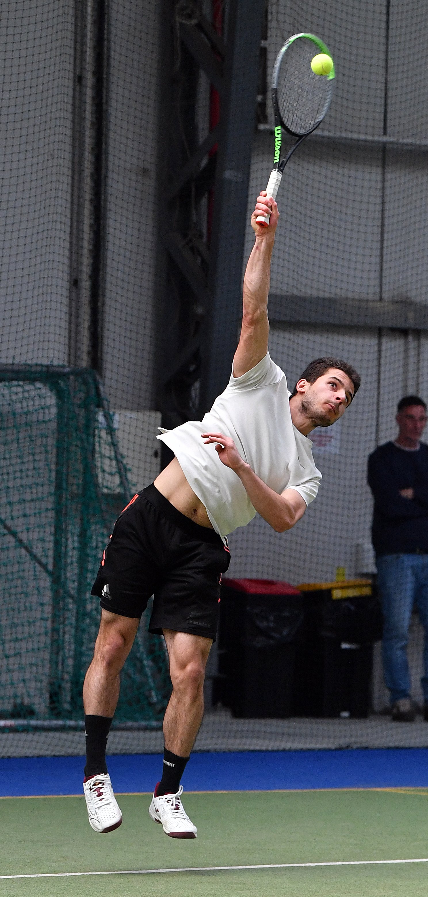 Marwan Samy fires in a serve during the men’s singles final at the Otago indoor open at the Edgar...