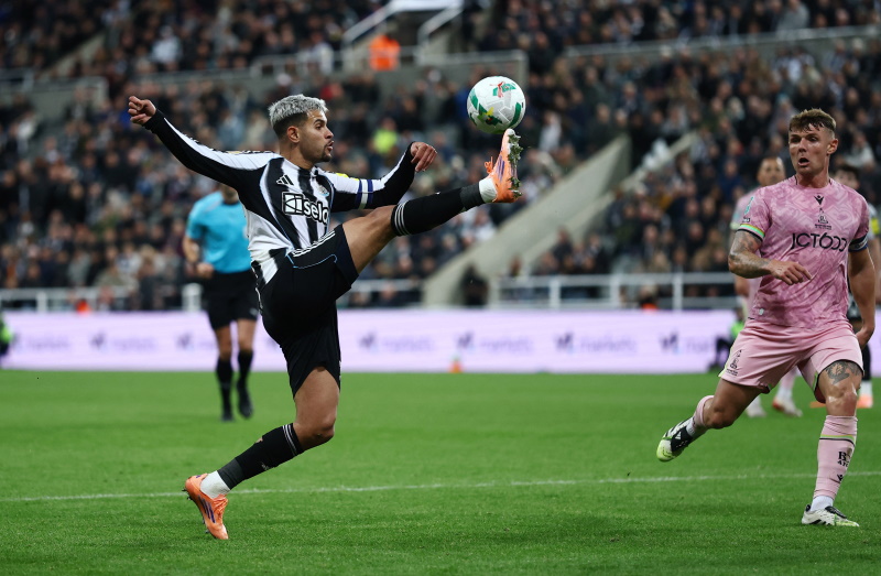 Newcastle United's Bruno Guimaraes controls the ball for Newcastle during their League Cup match...