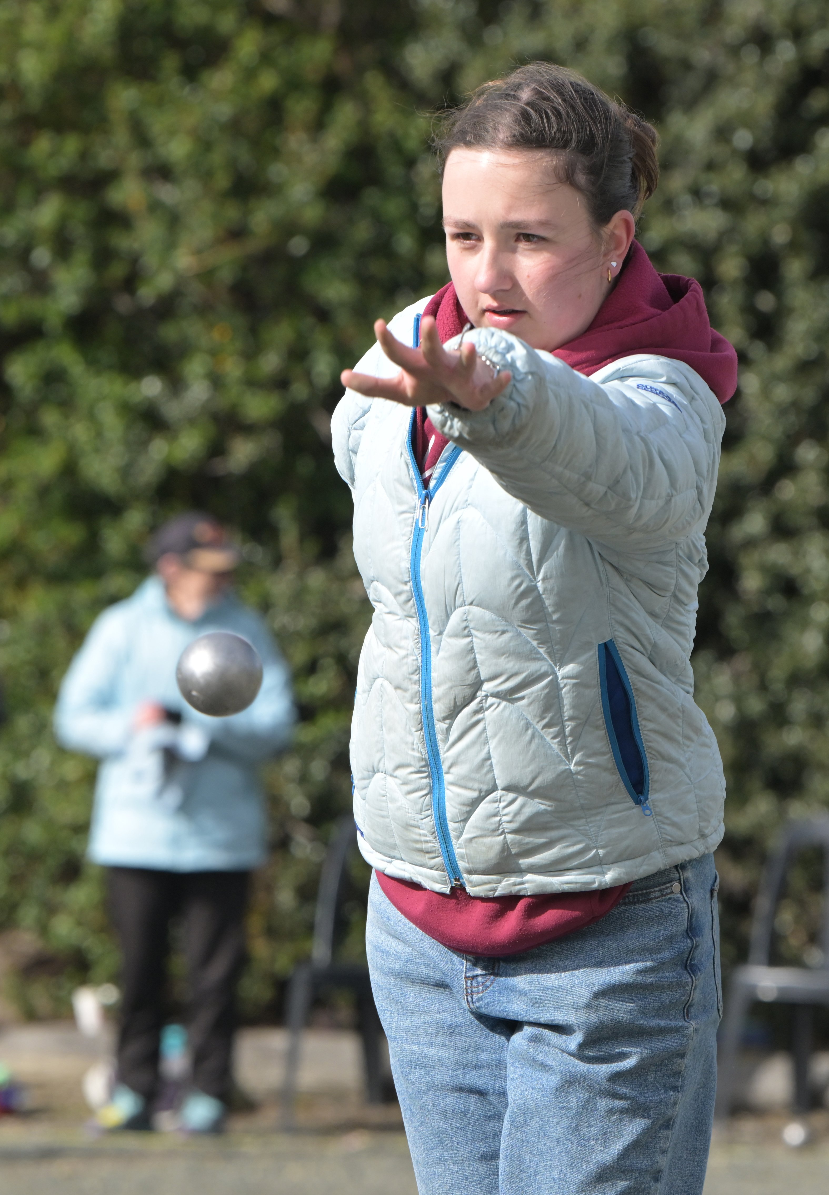 Dunedin City Petanque club member Brea Schofield takes her shot at the Te Waipounamu Mixed...