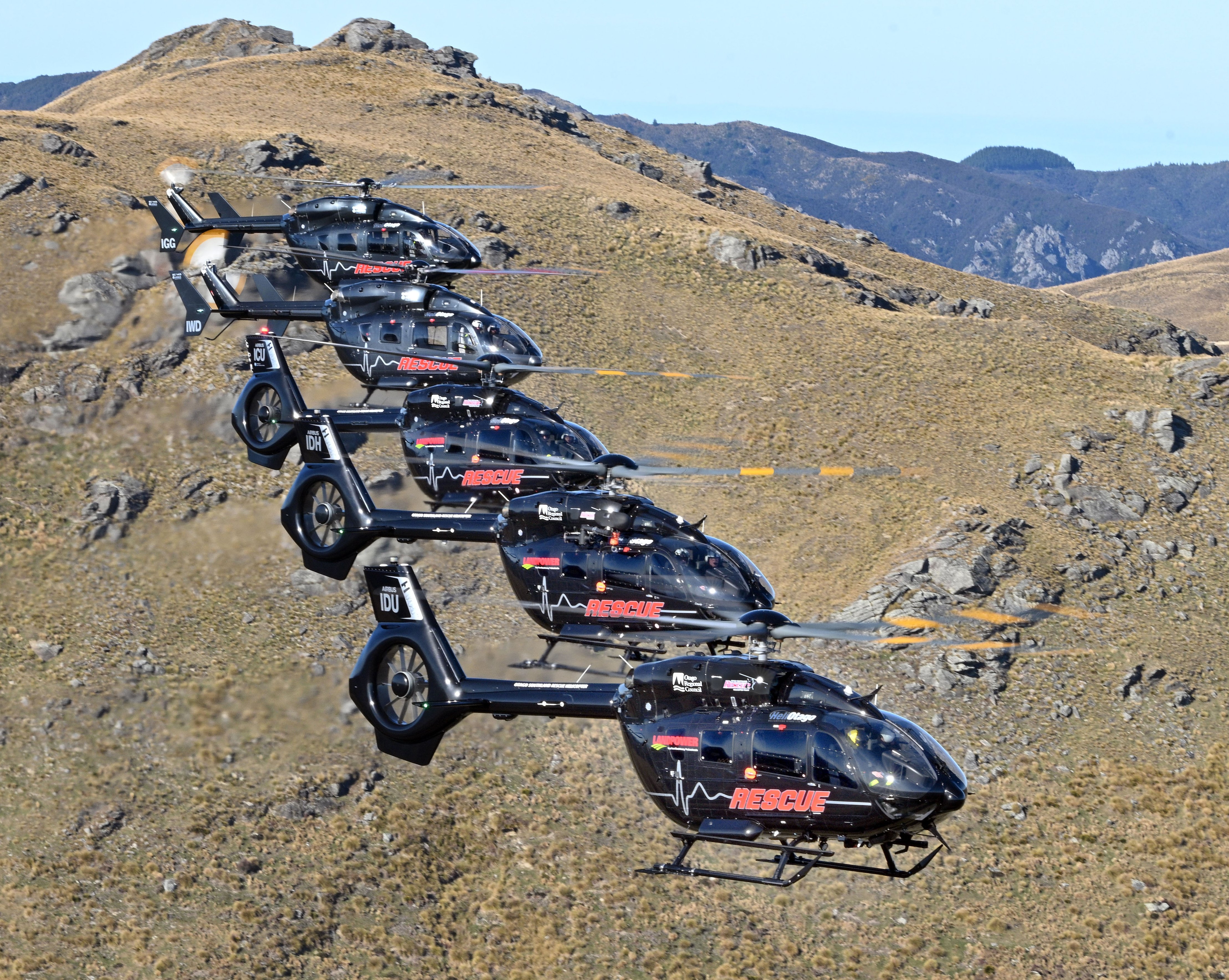 Half of the Helicopters Otago fleet of 10 dedicated rescue helicopters fly in tight formation...