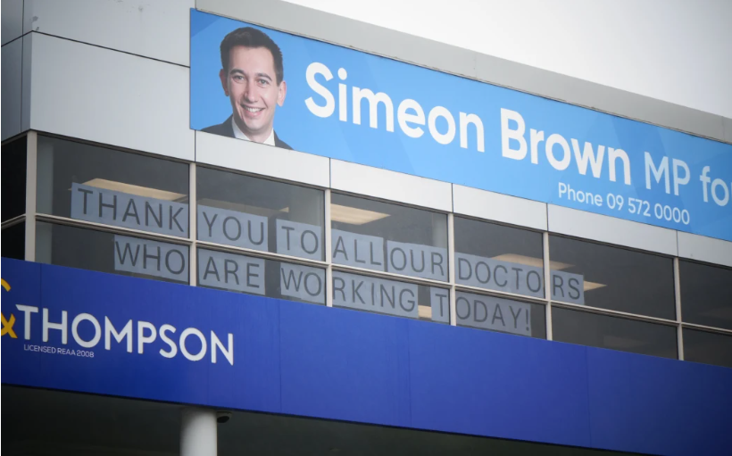 Another message in the window of the Health Minister's electorate office takes aim at striking...