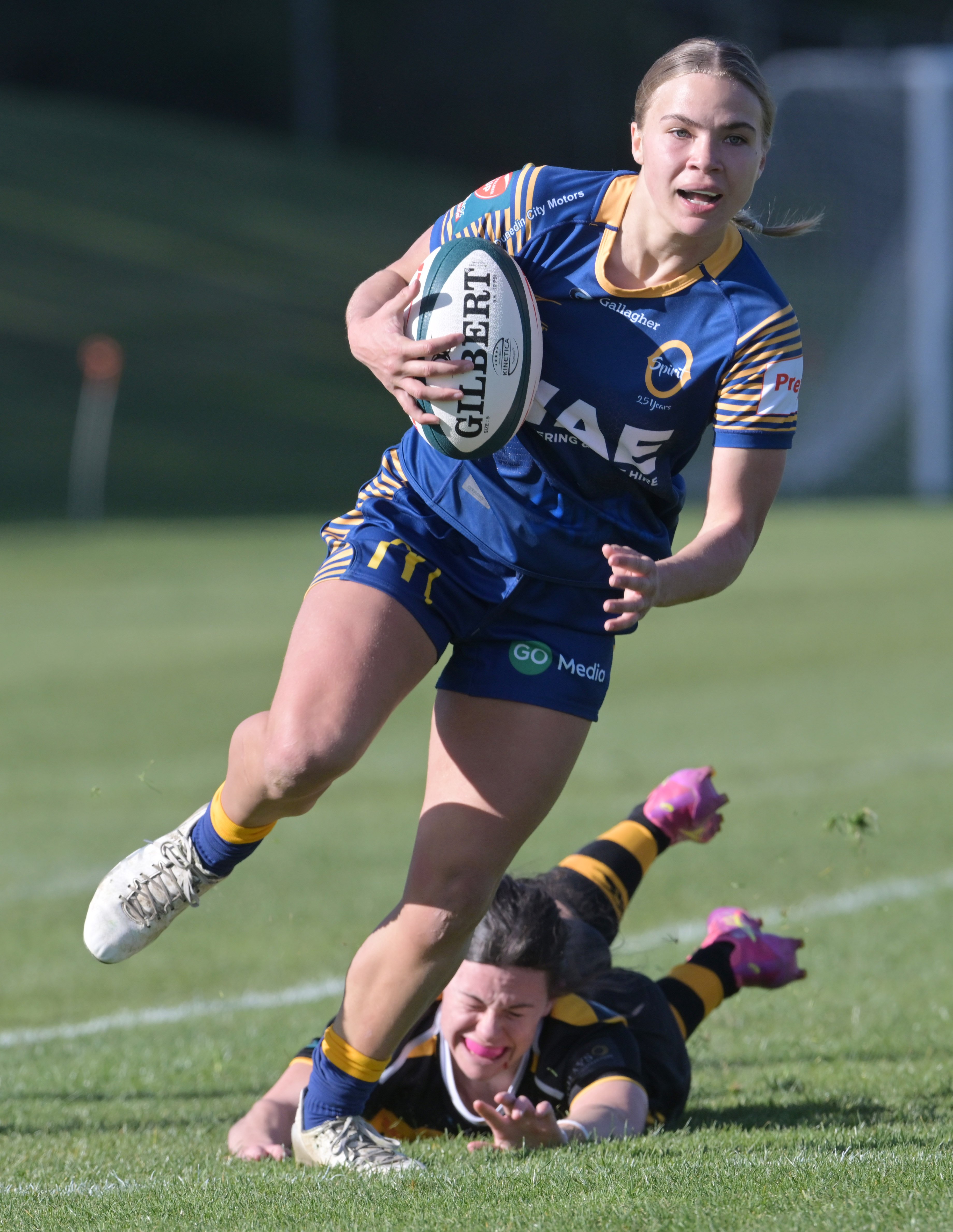 Otago Spirit fullback Olivia Fowler leaves Taranaki defender Hayley Coogan in her wake as she...