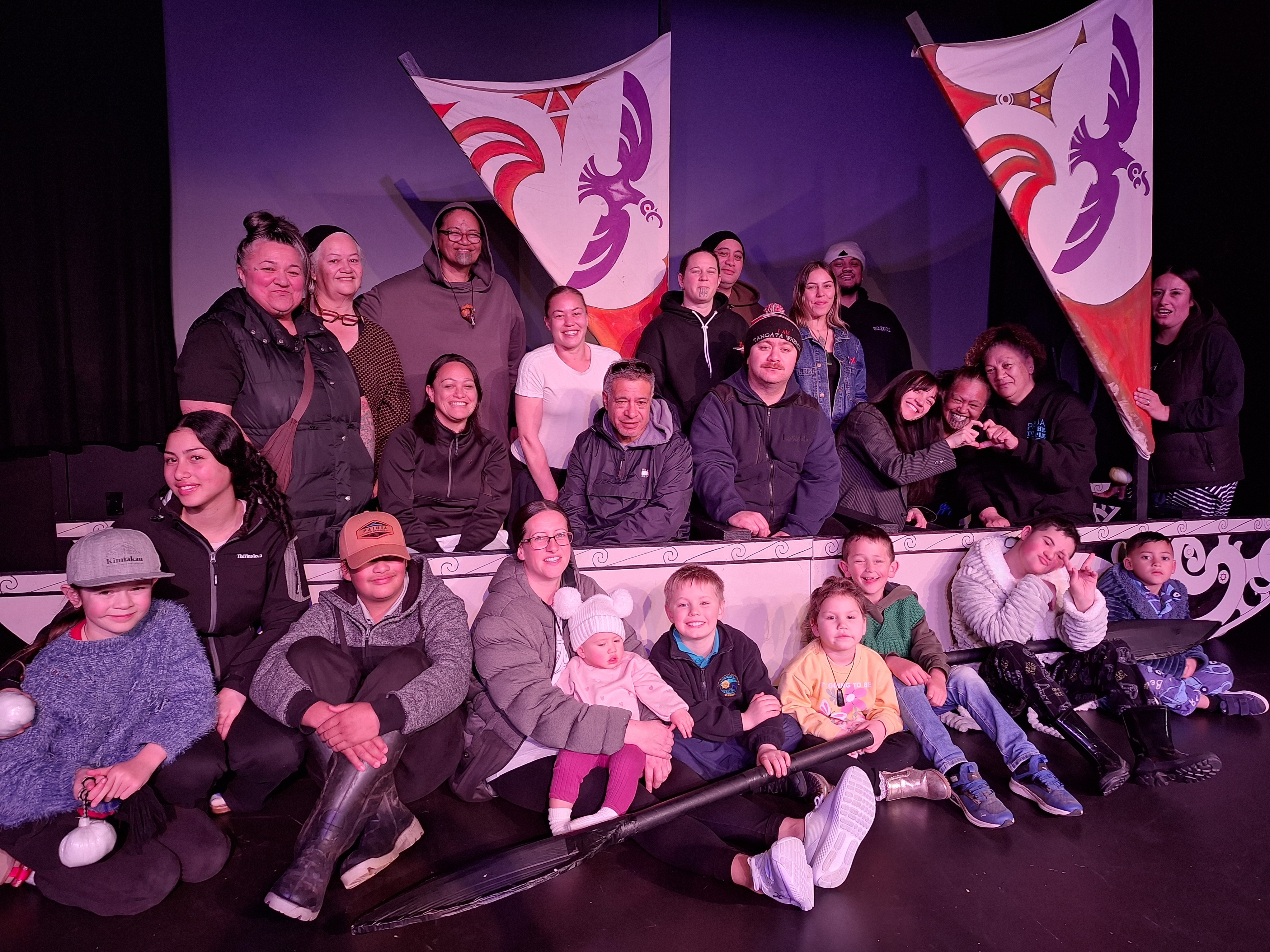 The cast and crew of the musical Tamatea and the Tākitimu Waka gather around the canoe on the...