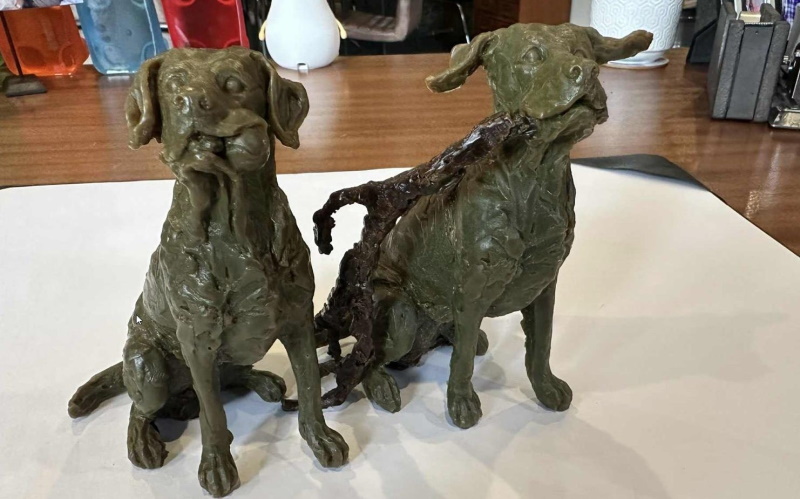 A sculpture of two bronze dogs will be placed in downtown Invercargill after much debate at a...