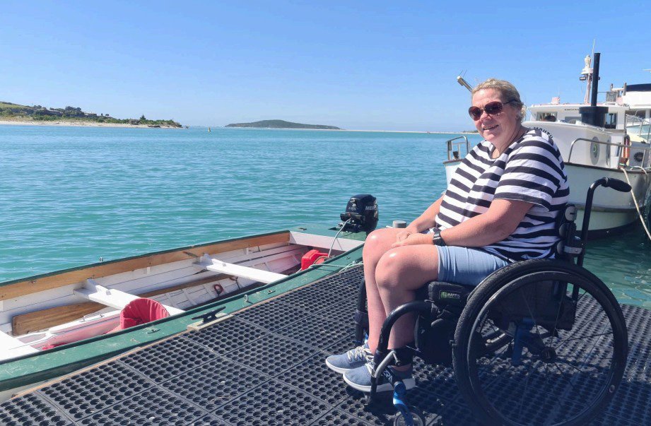 Sally Barkman on the pontoon at the new venue at Taieri Mouth.