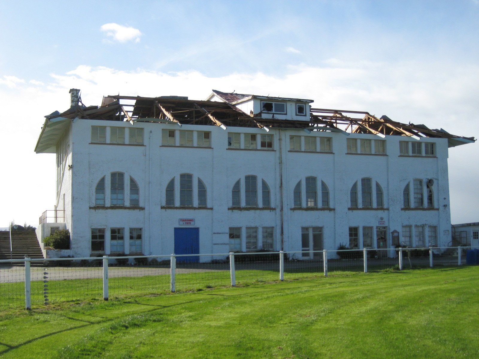 The canopy of the Wyndham Racecourse grandstand flew clean off during Thursday’s storm and by...