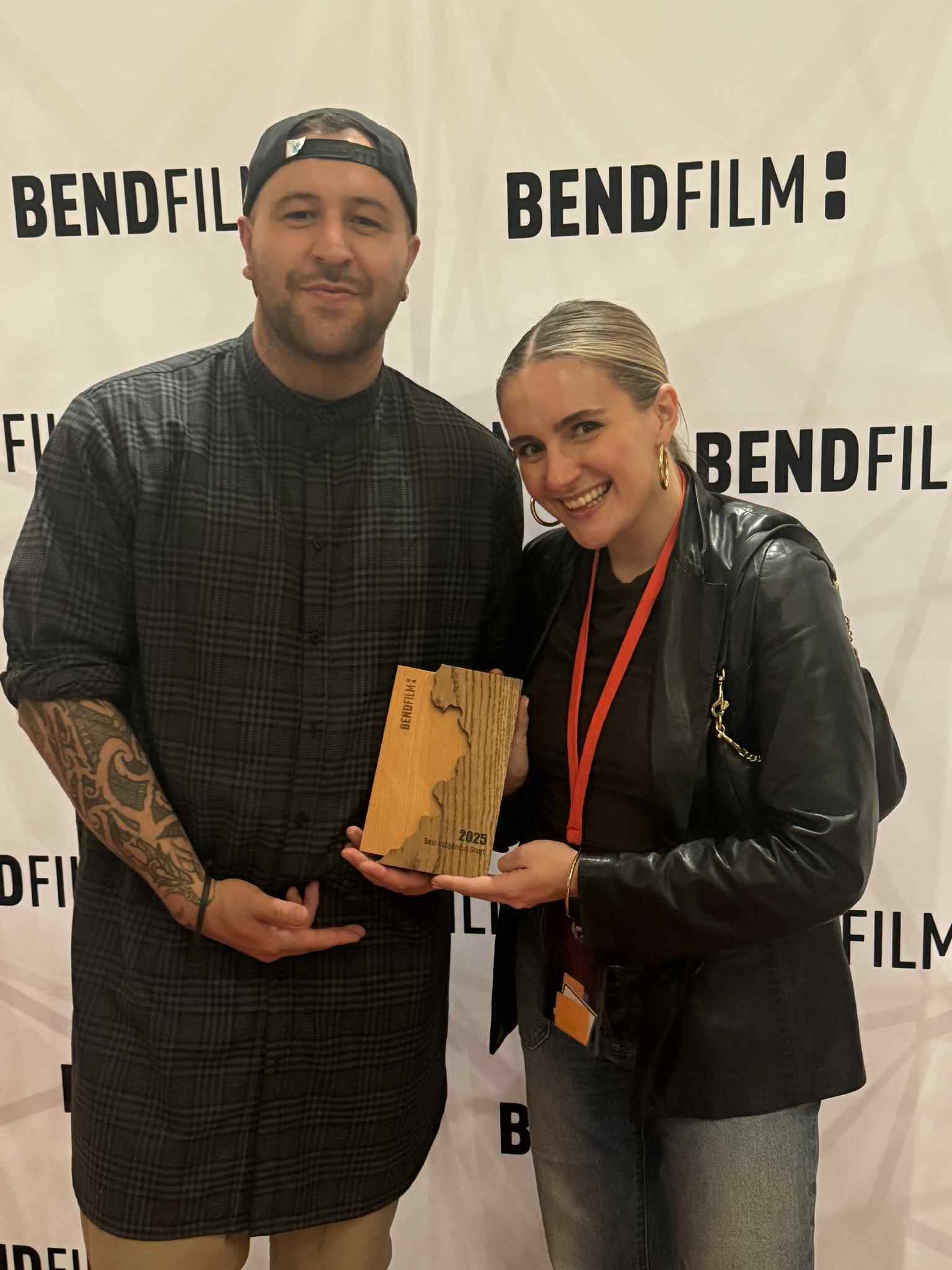 Invisible Dragons co-producer Madison Henry-Ryan and writer/director Victoria Boult after winning...