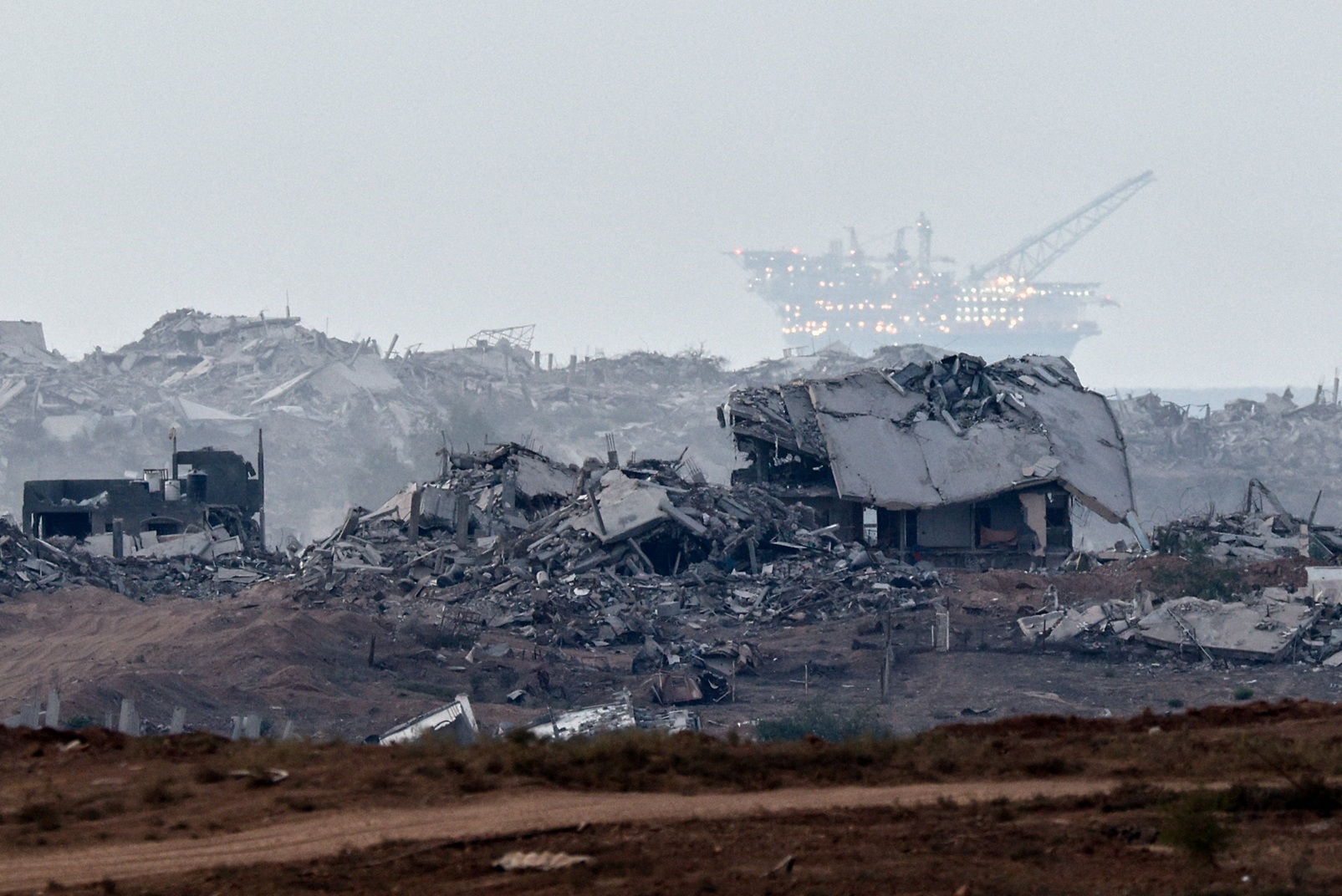 Destroyed buildings in Gaza as seen from Israel. Photo: Reuters