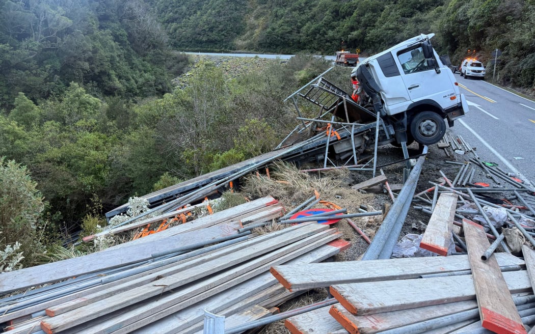 A truck crashed near Arthur's Pass (image modified to remove identifying company information)....