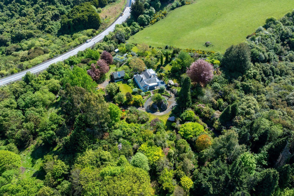 The Pine Hill property is surrounded by gardens. Photo: Rory Allardice