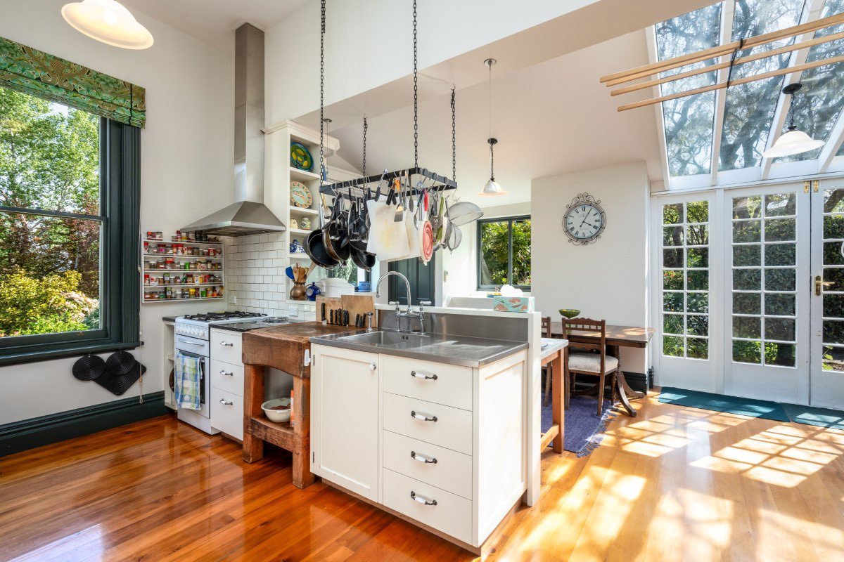 The farm-style kitchen includes plenty of storage. Photo: Rory Allardice